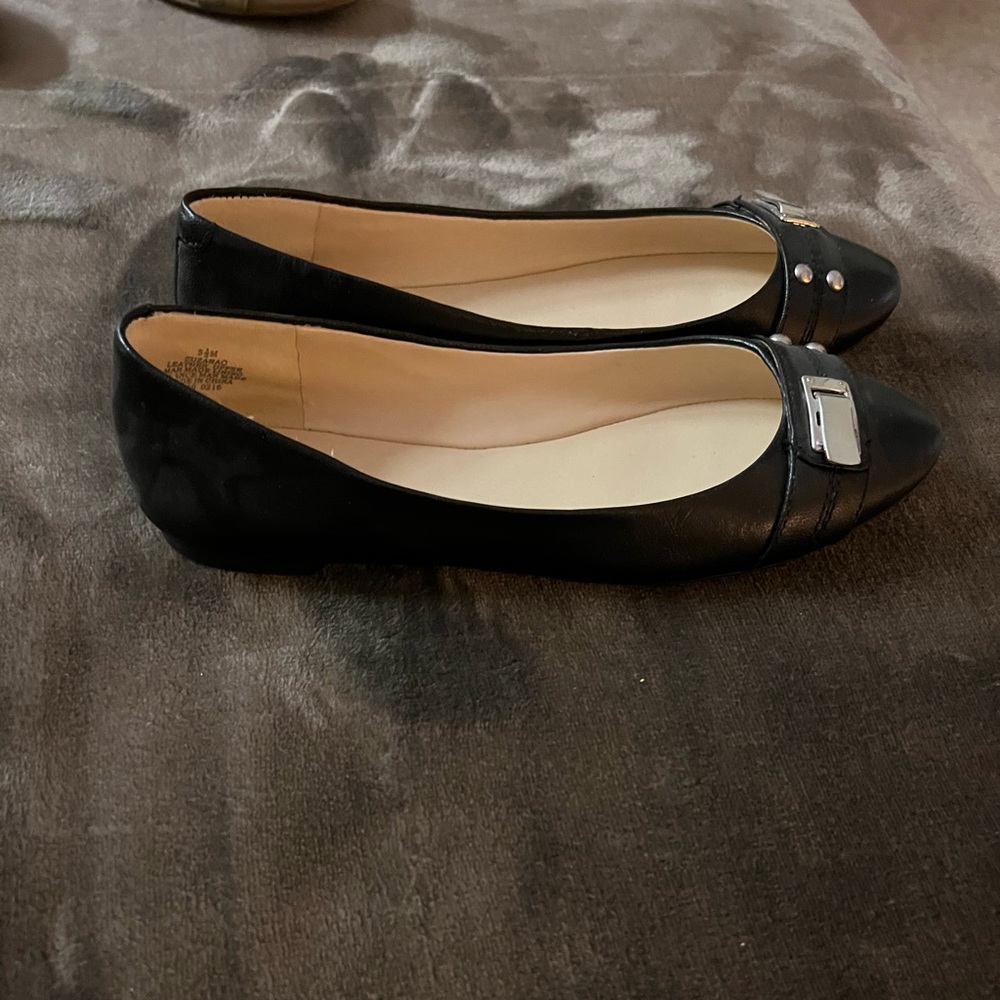 Nine West black leather flats size 5 1/2m women’s shoes with silver tone buckles